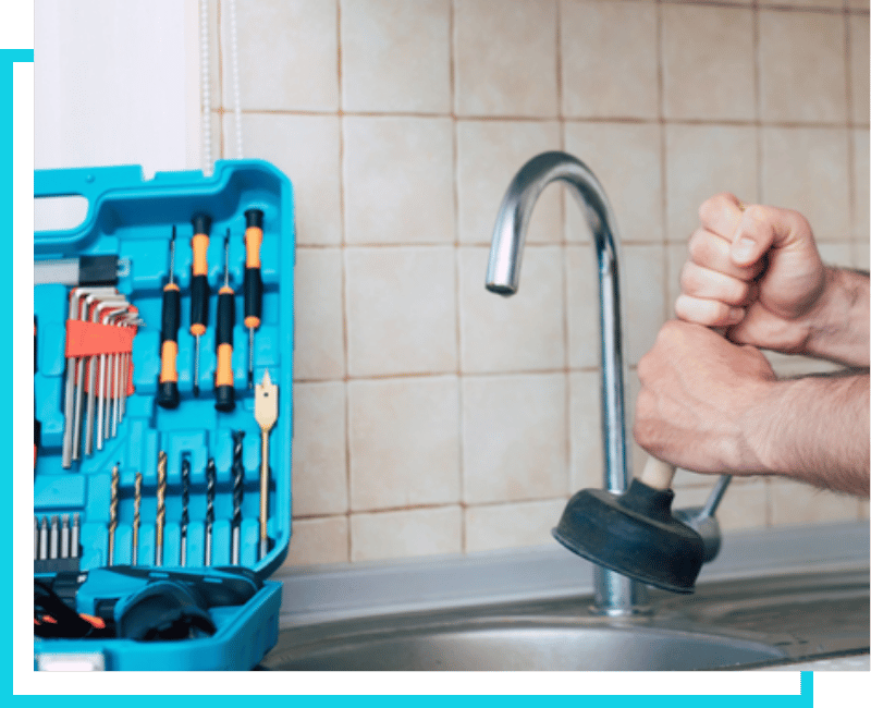 Plumber preparing equipment for kitchen drain service